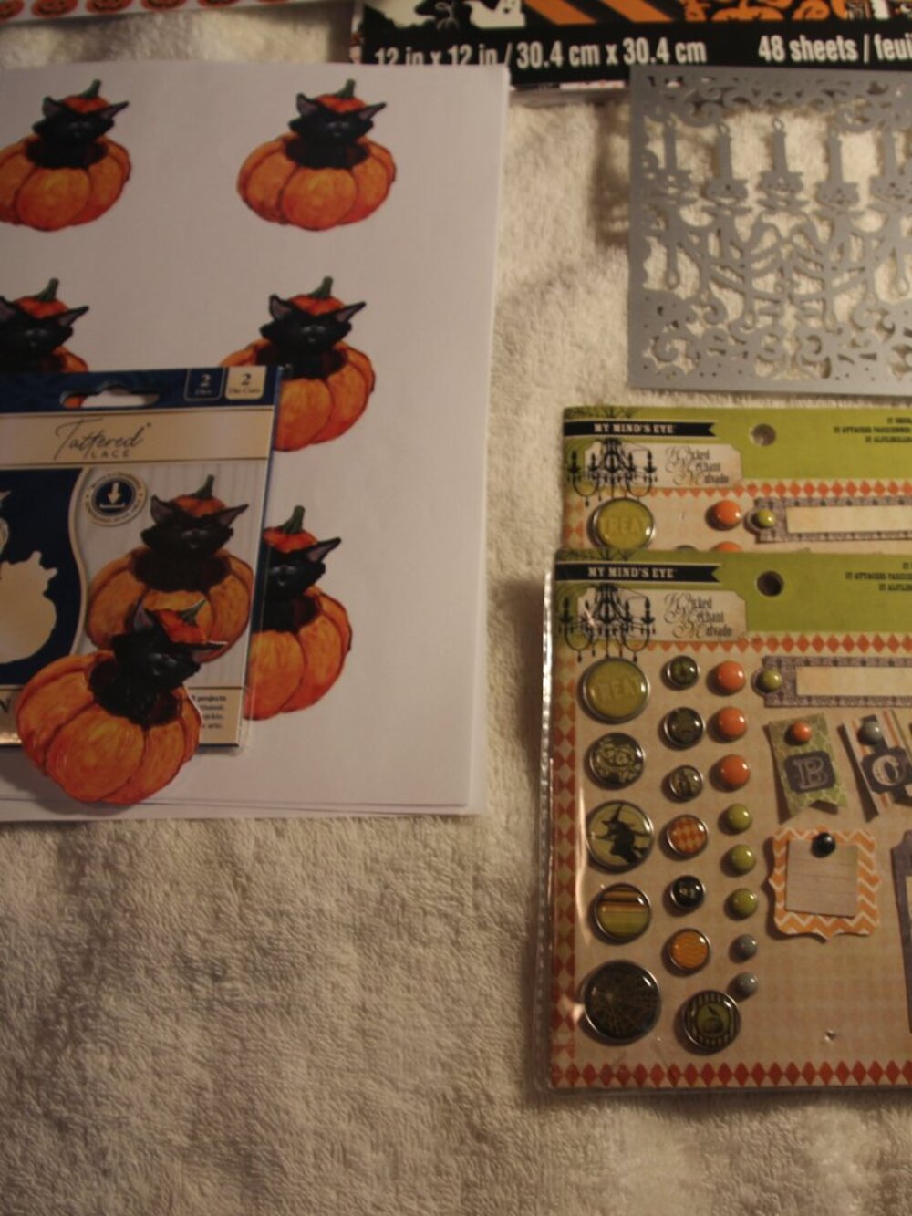 Halloween crafting supplies with dies and extras. New to gently used.